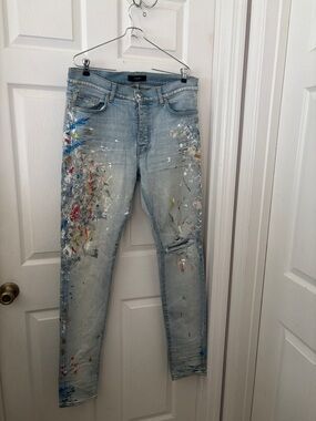 AMIRI Light Blue Skinny Jeans with Multi-Color Paint Splatter